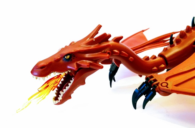 Head detail of Smaug dragon figure from The Hobbit