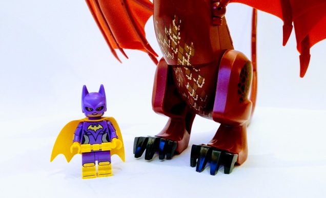 Lego dragon figure legs with minifigure for scale